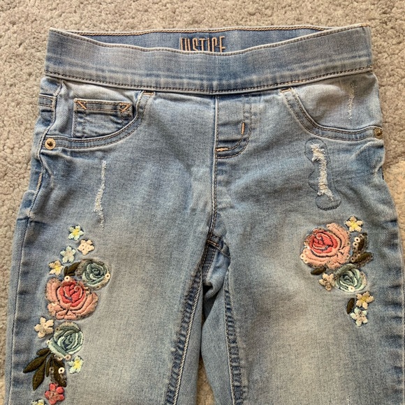 Justice Mid Rise Legging Jeans with Pink Floral Stitching - Picture 2 of 6